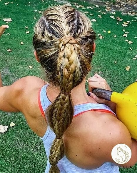 27 Gym Hairstyles For Long Hair Inspo That's Giving Us Everything 6 Braided Half-Up Top Knot