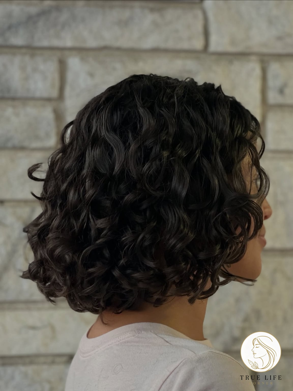 Chin-Length Curly Bob That Frames Everything Right