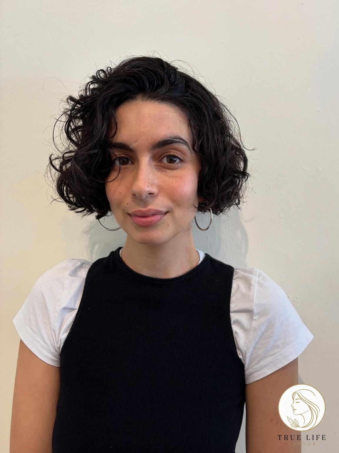 Curly Bob That Hits Right Above the Shoulders
