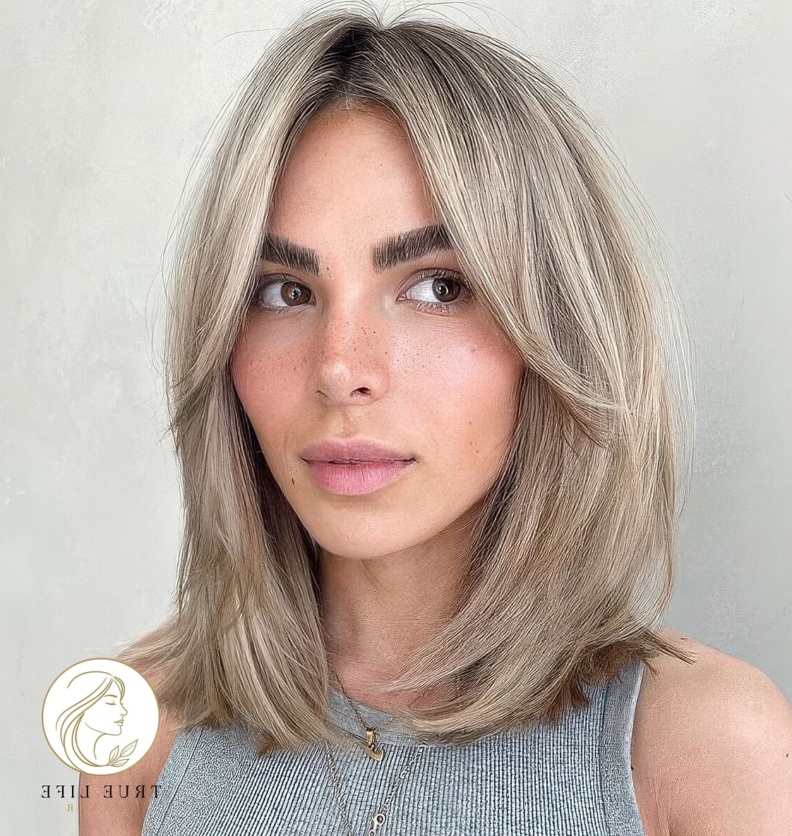 13 Cute Medium Length Hairstyles Everyone Is Pinning Right Now 3 Curtain Bangs With Long Layers