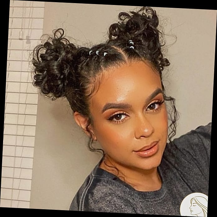 7 Hairstyles For Short Hair Curly We're Obsessed With Right Now 10 The Effortless Chignon