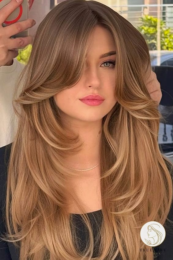 17 Cute Hairstyles For Long Hair Inspo That's Giving Us Everything 2 Face-Framing Curtain Bangs with Long Layers