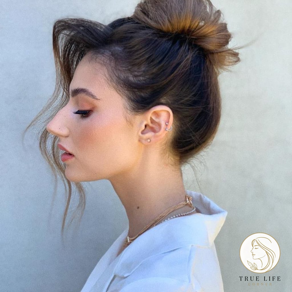 25 Prom Hairstyles For Short Hair Everyone Is Pinning Right Now 4 High Bun with a Side Tendril
