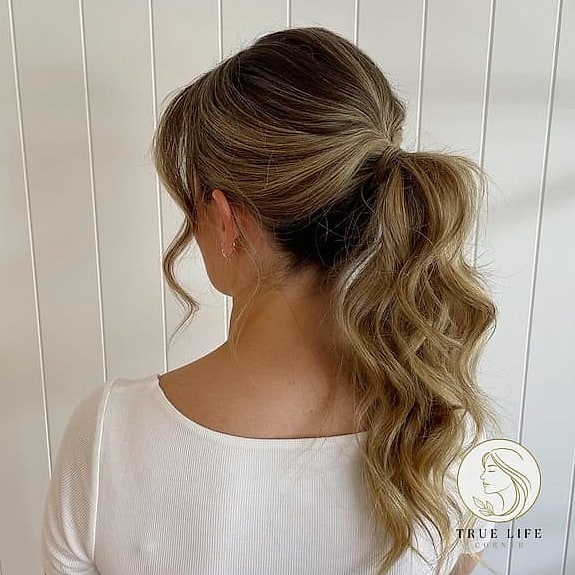 25 Hairstyles For Medium Length Hair With Layers That Are Trending on Pinterest This Week 21 Layered Ponytail Style