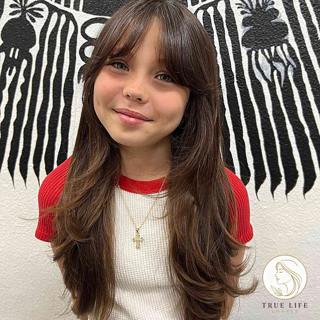 15 Hairstyles For Short Hair For School That Prove This Trend Is Here to Stay 14 Long Layered Cut with Curtain Bangs