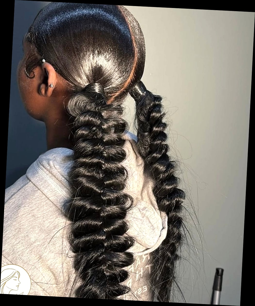 10 Short Natural Hairstyles For Black Women That Are Both Cute and Low Maintenance 9 Loose Fishtail Braid