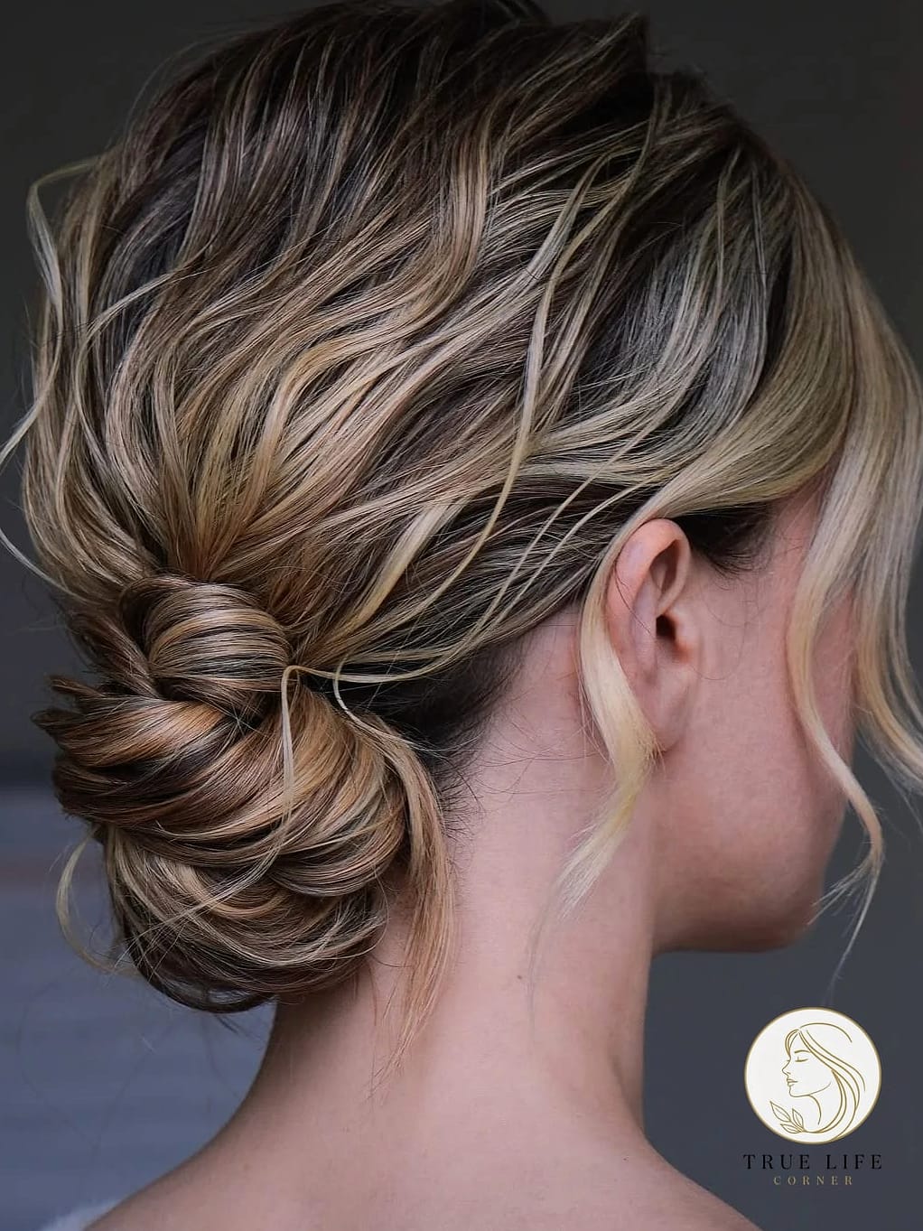 20 Summer Hairstyles For Long Hair That Are Trending on Pinterest This Week 19 Low Bun With Face-Framing Tendrils