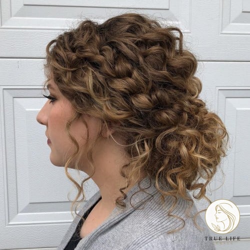 Low Curly Bun with Loose Curls