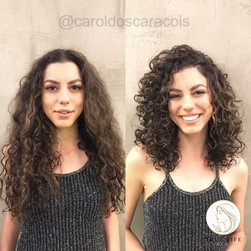 Medium Curly Deep Side Part Hairstyle