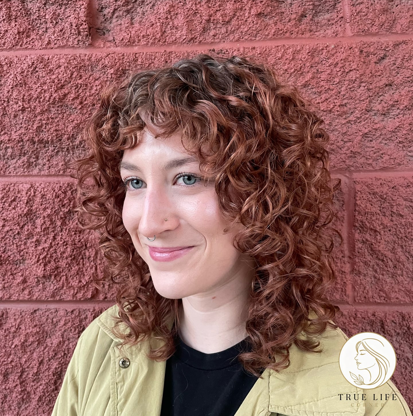 Rustic Copper Medium-Length Curls with Artful Layering