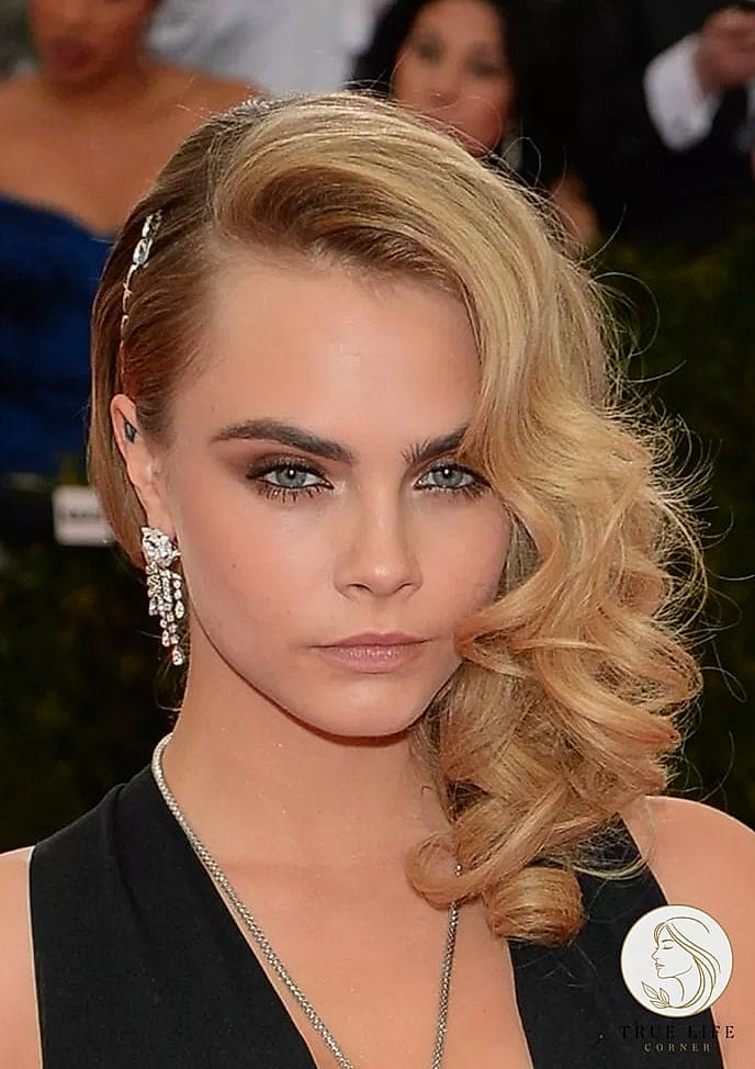 13 Hairstyles For Long Hair We're Obsessed With Right Now 10 Side Swept Long Hair with Volume