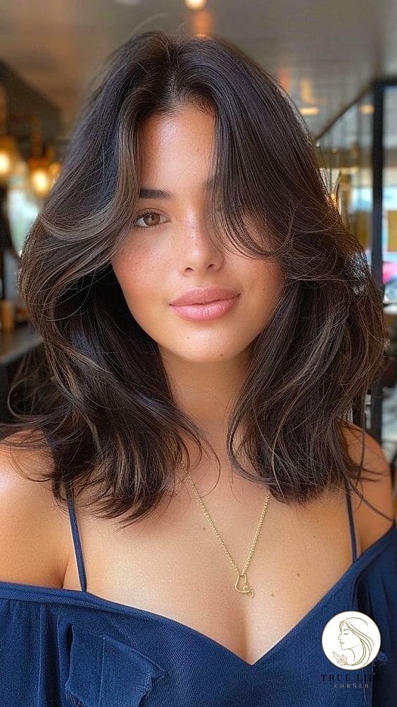 14 Easy Hairstyles For Medium Length Hair You'll Want to Re-Create Immediately 9 Sleek Middle Part with Glossy Finish