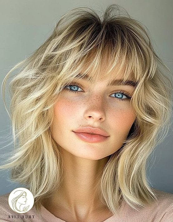 Soft Waves With Wispy Face-Framing Layers