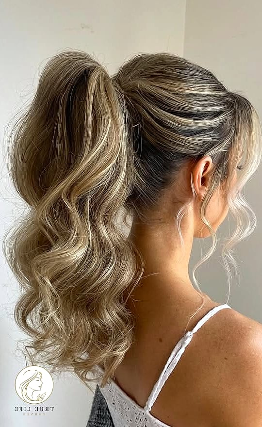 23 Prom Hairstyles For Medium Hair for When You Need a Fresh Change 6 Textured Ponytail With Face-Framing Pieces