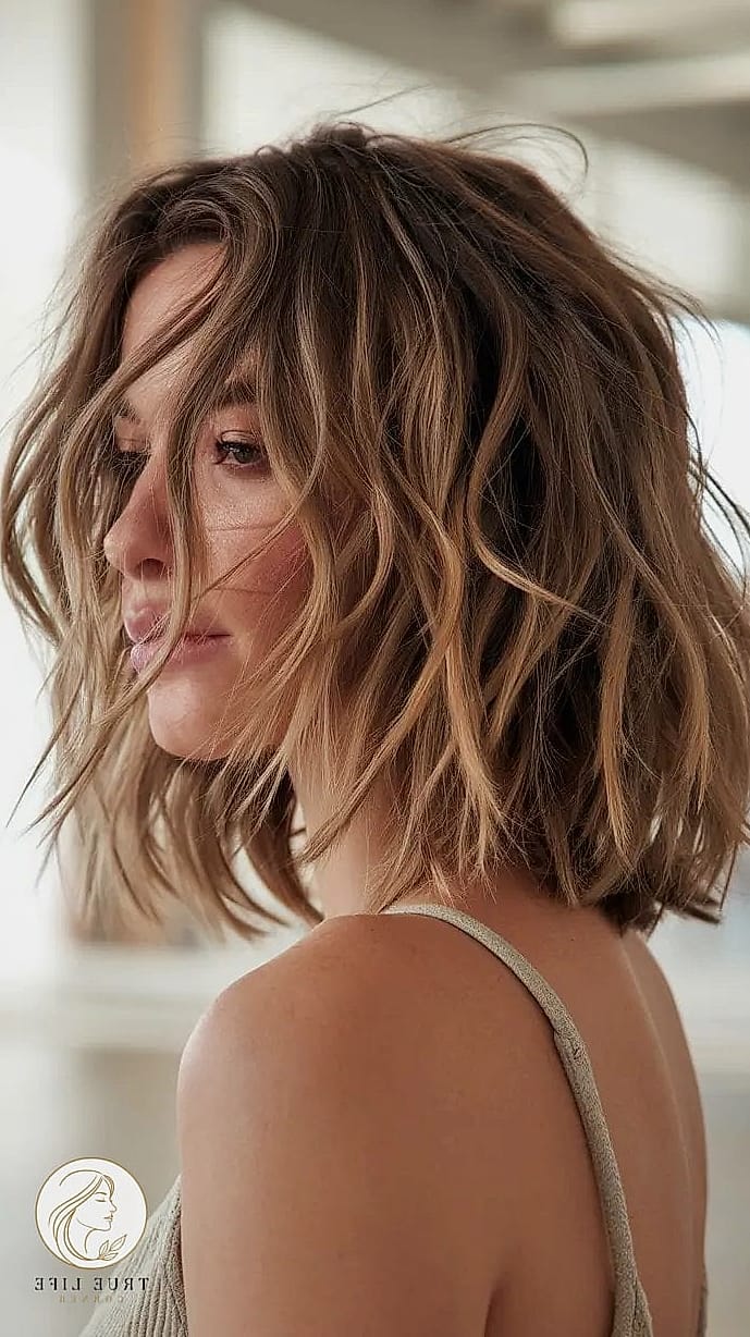 13 Cute Medium Length Hairstyles Everyone Is Pinning Right Now 14 Tousled Lob With Highlights And Lowlights