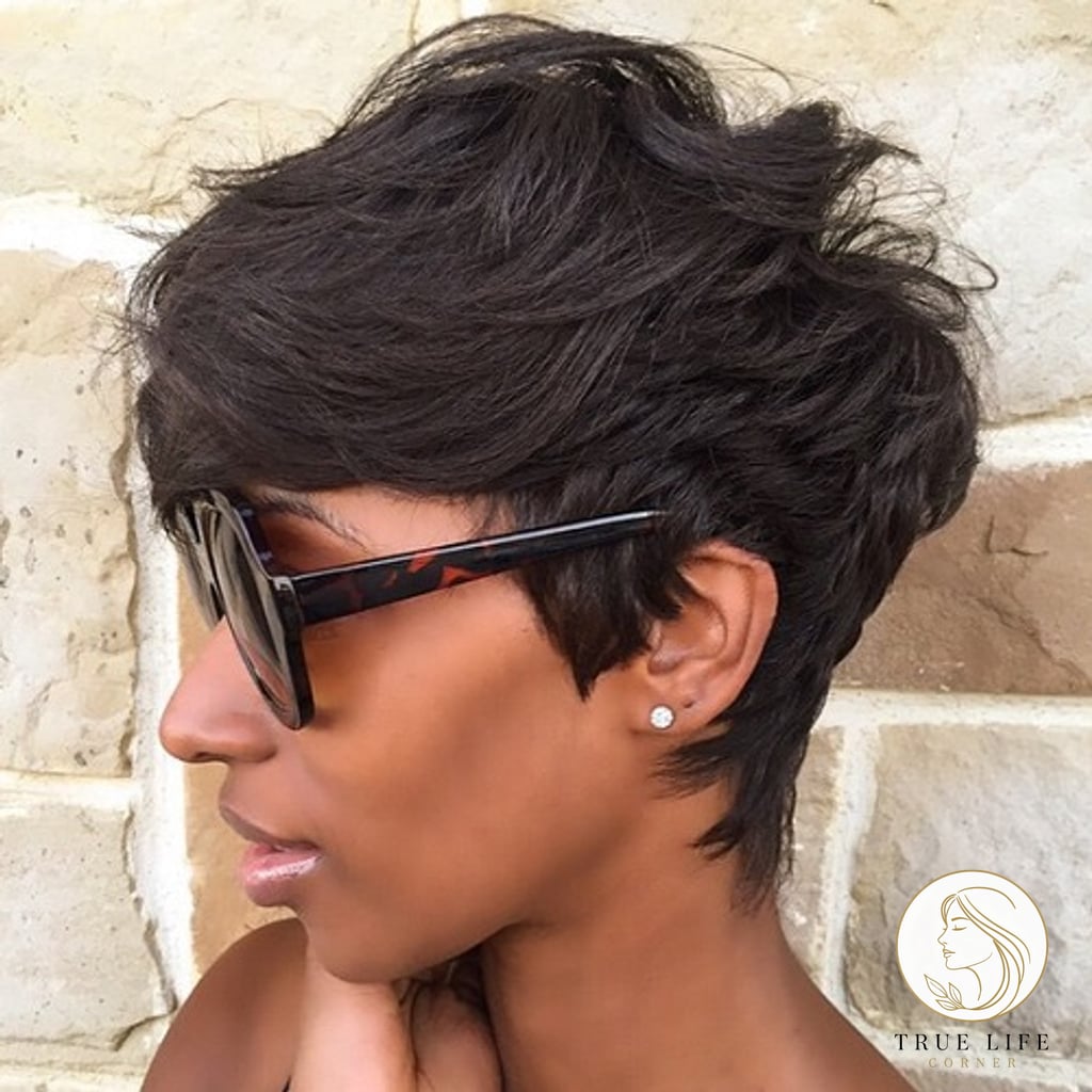 14 Hairstyles For Short Hair Black Women for When You Need a Fresh Change 4 Tousled Pixie with Layered Bangs