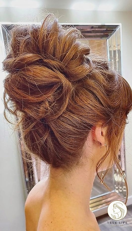 Tousled Updo With Loose Strands