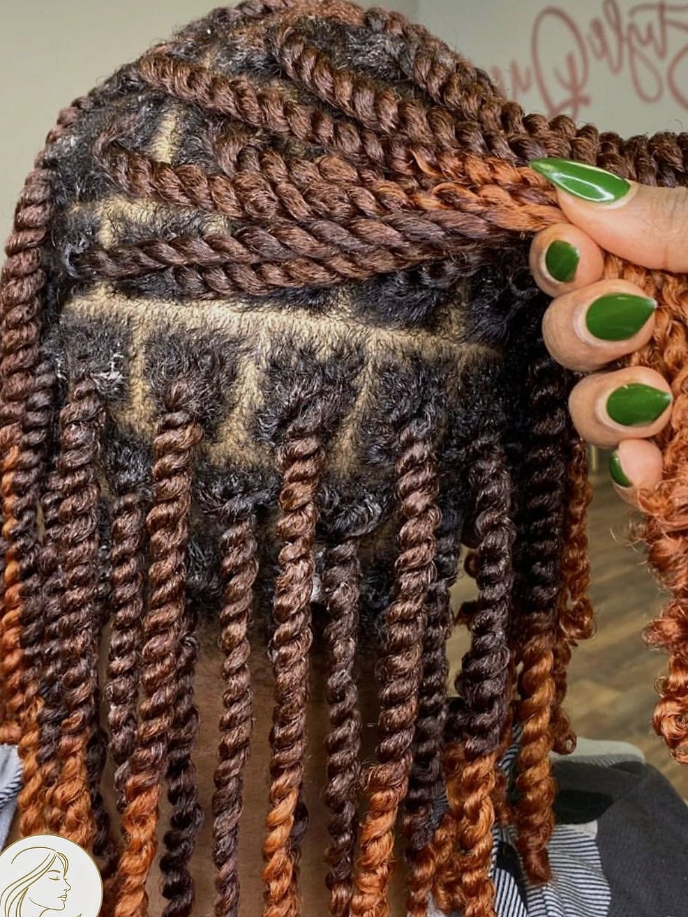 9 Short Afro Hairstyles That Work on Every Hair Length 8 The Twisted Half-Up Bun