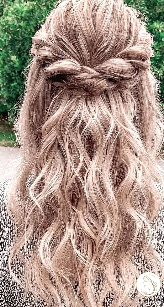 The Twisted Half-Up With a Claw Clip