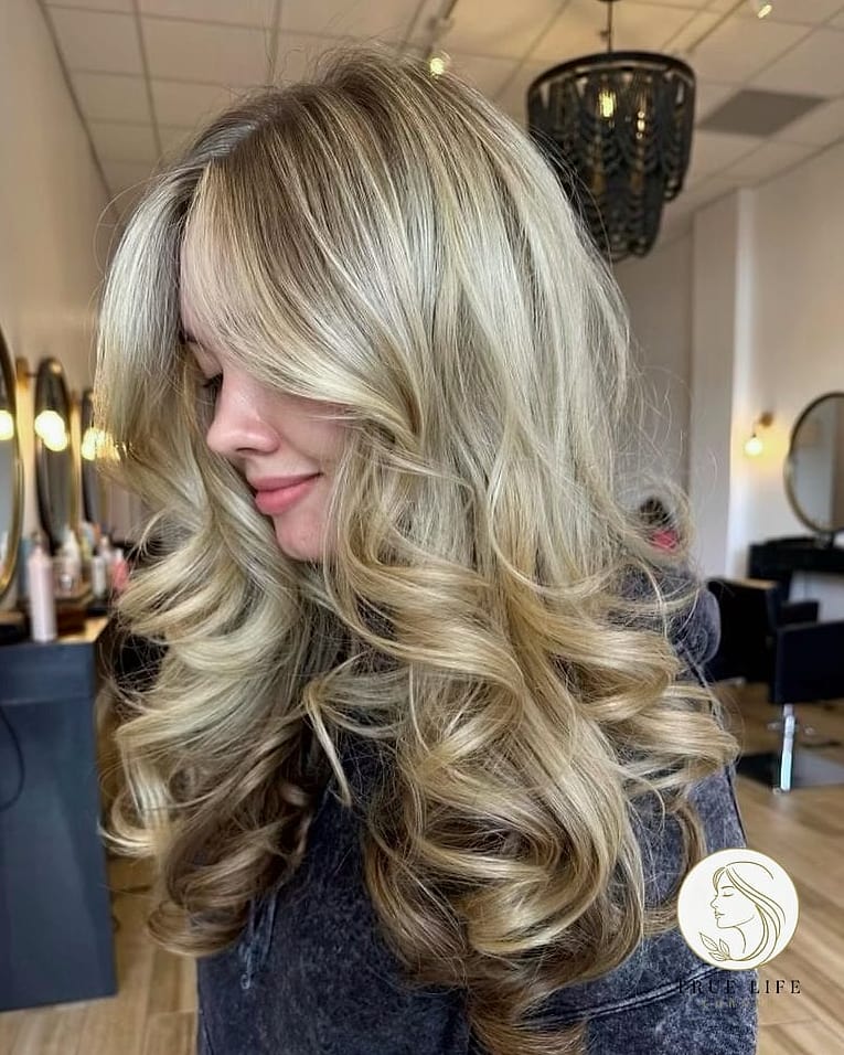 11 Formal Hairstyles For Long Hair Ideas You Need to Try Right Now 9 Voluminous Blowout With Curled Ends
