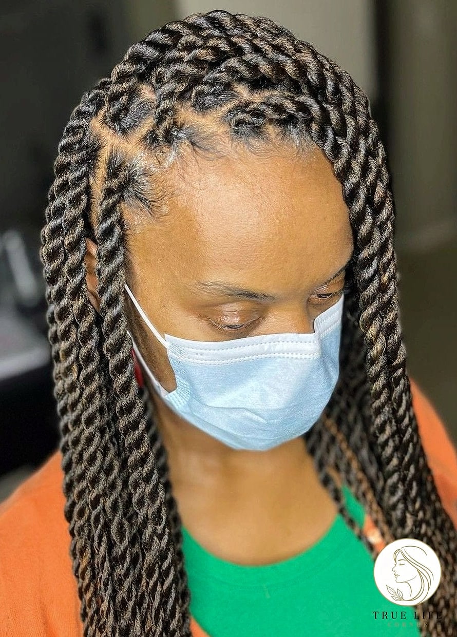 22 Twist Braid Hairstyles to Save Before They Blow Up 16 Chunky Twists with a Deep Middle Part