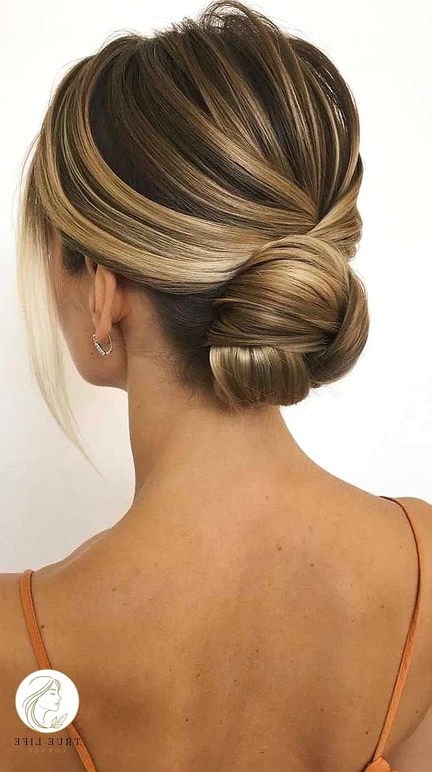 14 Up Hairstyles For Long Hair Perfect for Your Next Salon Appointment 2 Classic Low Bun