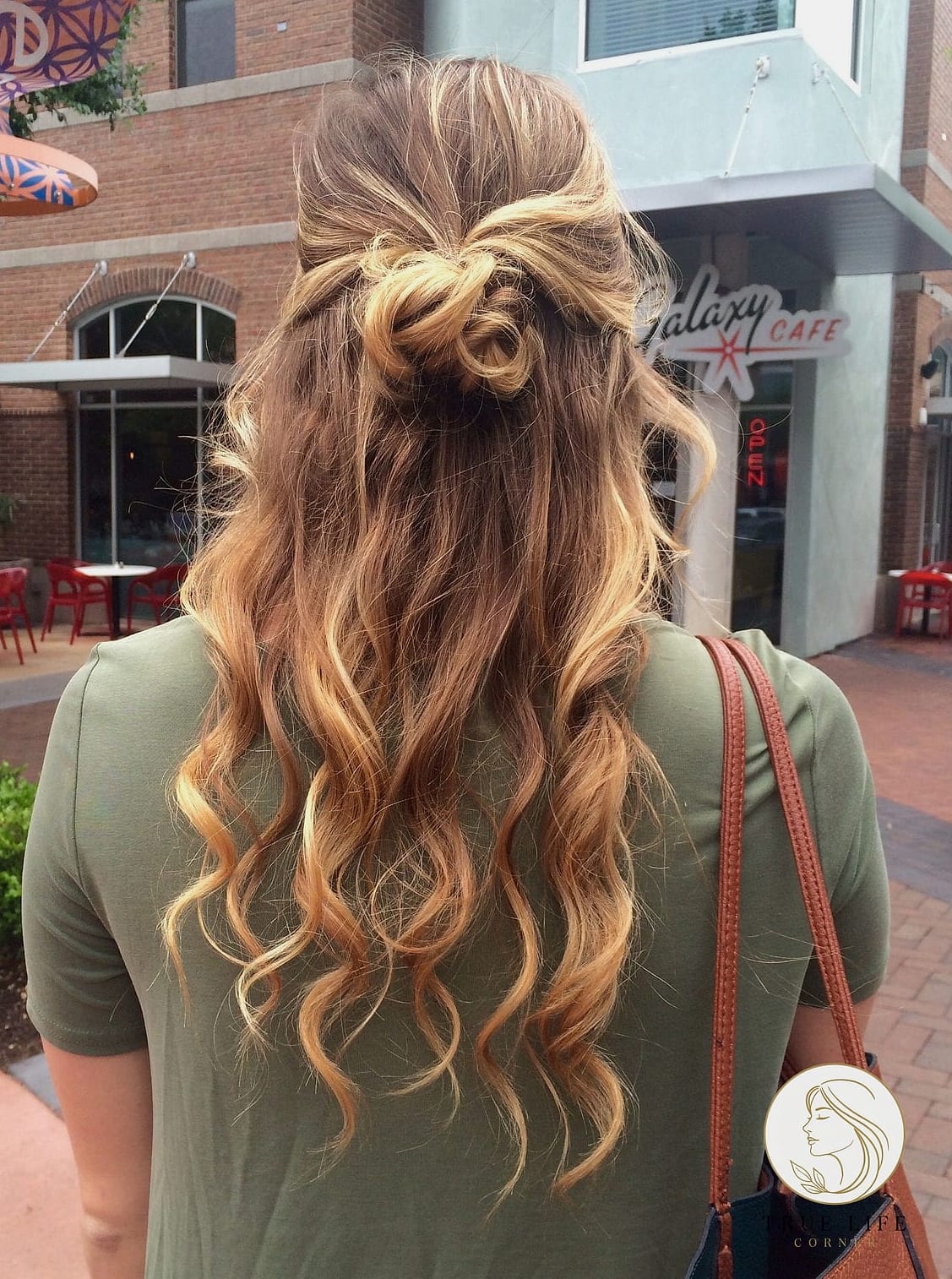 30 Bun Hairstyles For Long Hair That Belong on Your Inspiration Board 19 Curly Half-Up Bun