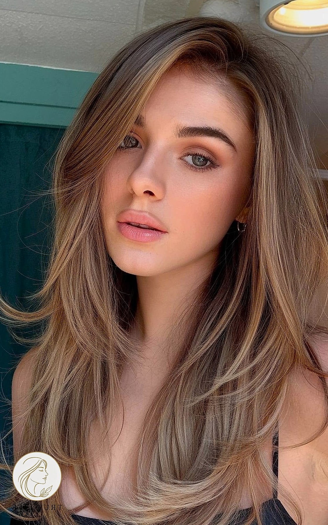 18 Easy Long Hairstyles for the Ultimate Glow Up 9 Deep Side Part with Volume