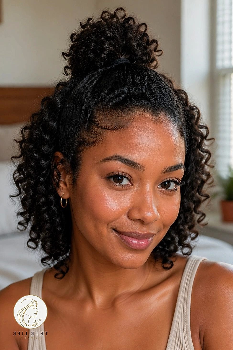 7 Easy Curly Hairstyles That Are Both Cute and Low Maintenance 4 Half-Up Curly Puff