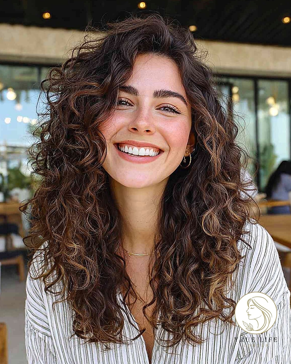 Long Curly Layers With A Middle Part