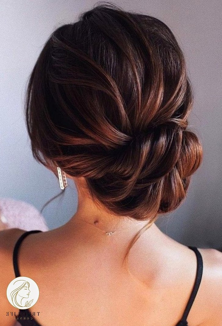 Low Bun With Face-Framing Pieces