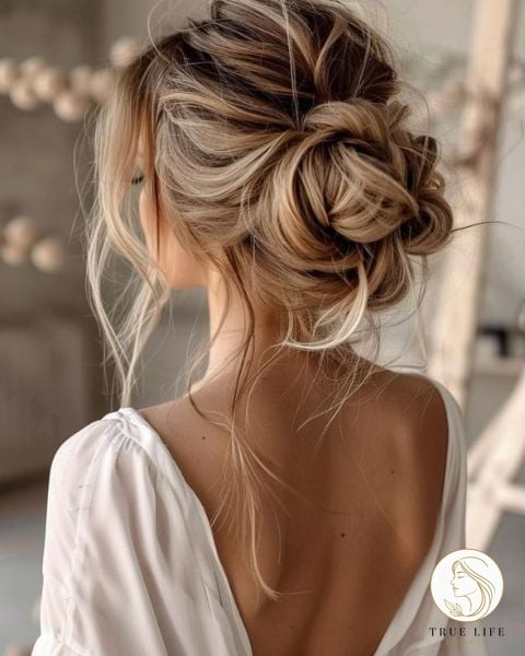 30 Bun Hairstyles For Long Hair That Belong on Your Inspiration Board 2 Messy Bun Hairstyle for Long Hair Women