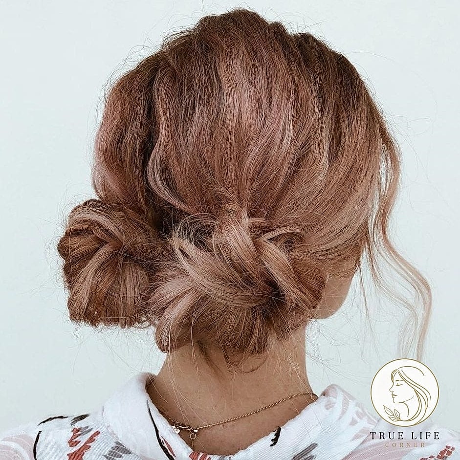 18 Cute Hairstyles For Medium Hair Perfect for Your Next Salon Appointment 17 Sleek Low Bun With Face-Framing Strands