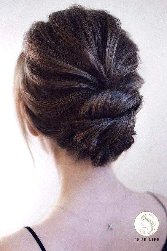 30 Bun Hairstyles For Long Hair That Belong on Your Inspiration Board 4 Sleek Low Bun