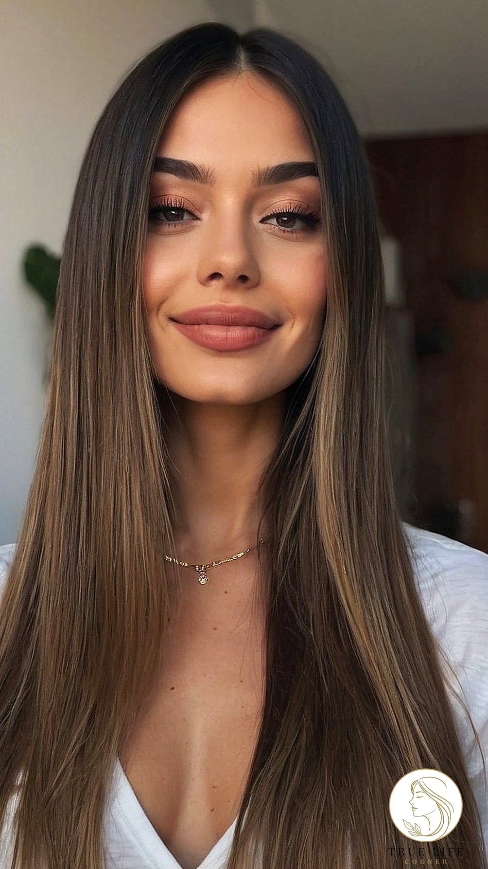11 Elegant Hairstyles For Long Hair Perfect for Your Next Salon Appointment 3 Sleek Straight Hair with a Middle Part