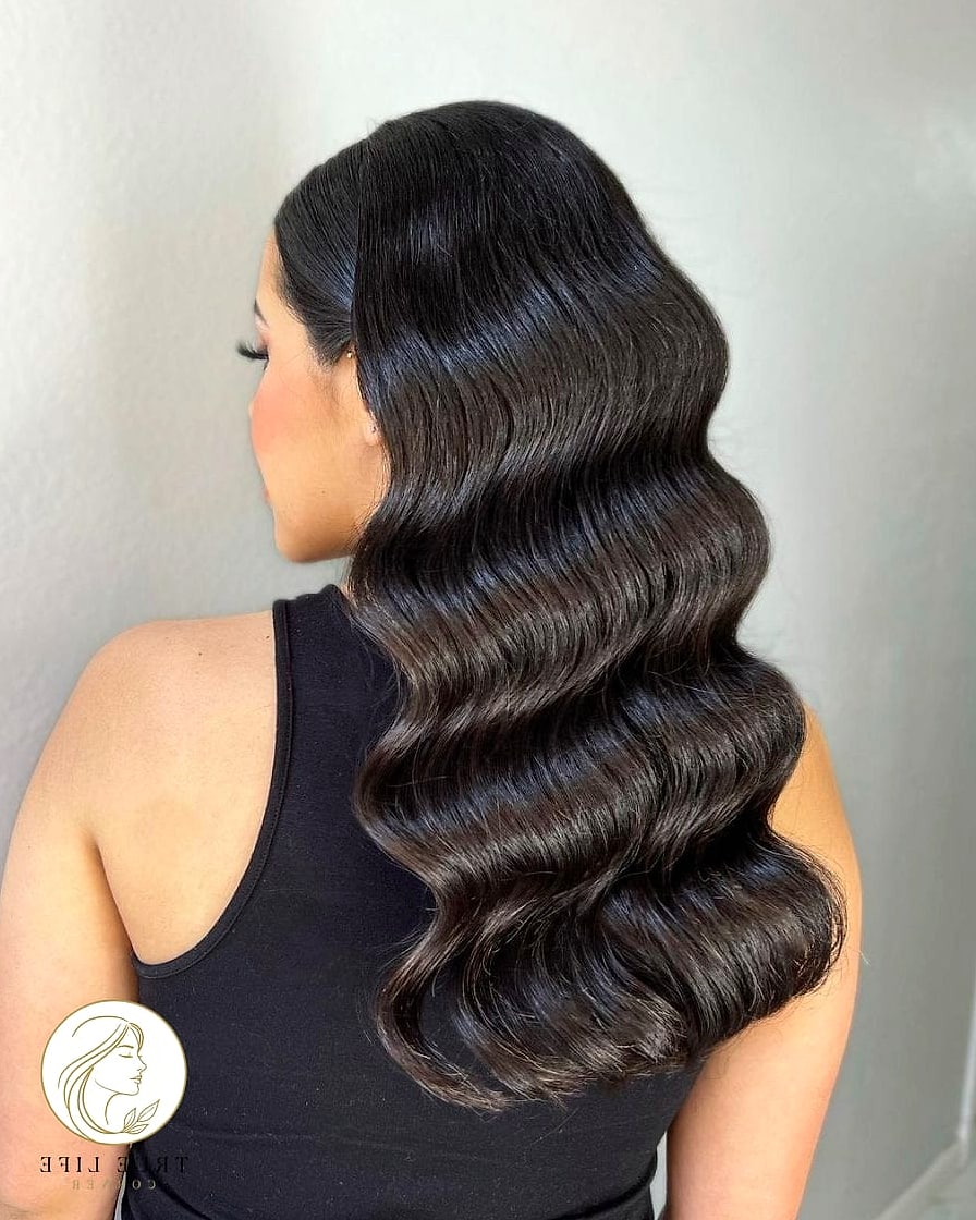 16 Party Hairstyles For Long Hair to Show Your Stylist ASAP 10 Soft Glam Waves with a Middle Part