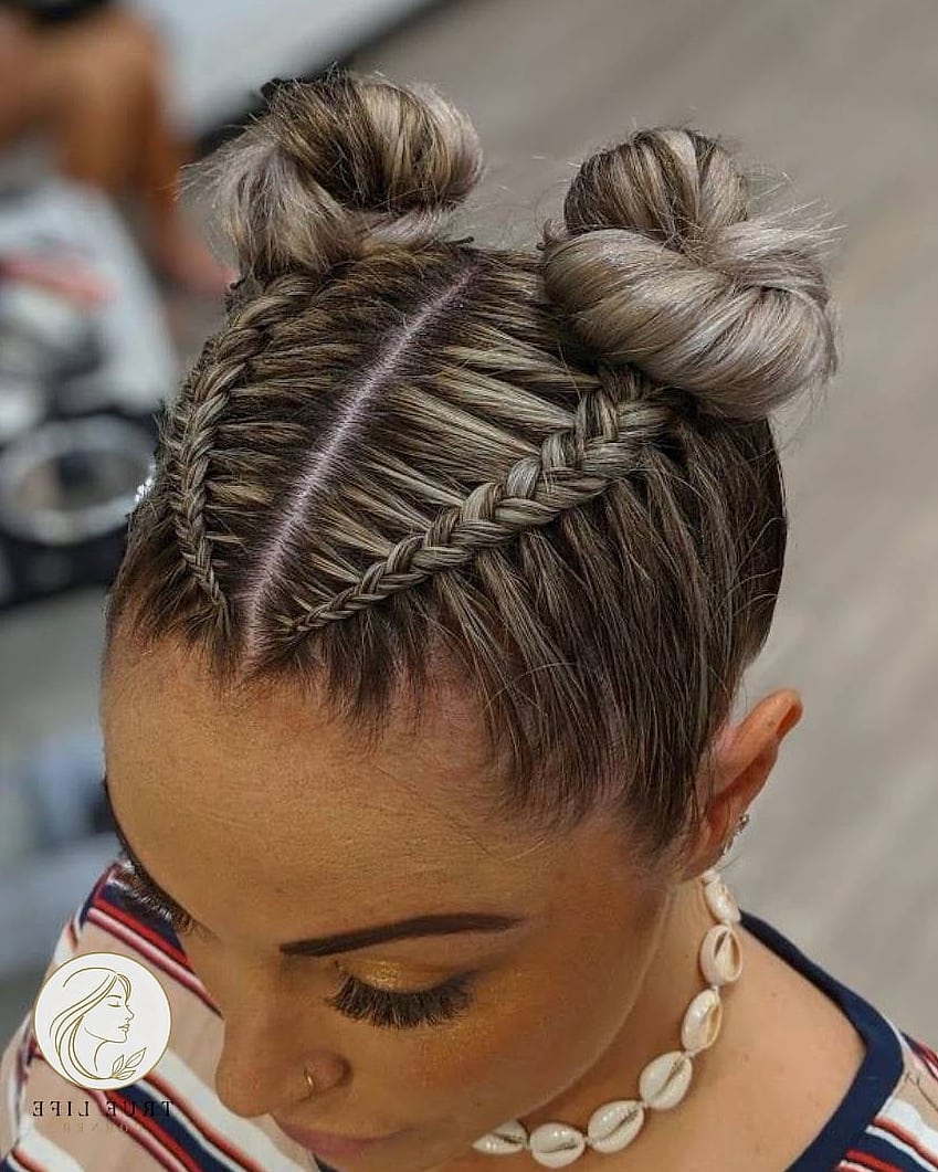 30 Bun Hairstyles For Long Hair That Belong on Your Inspiration Board 20 Twisted Space Buns