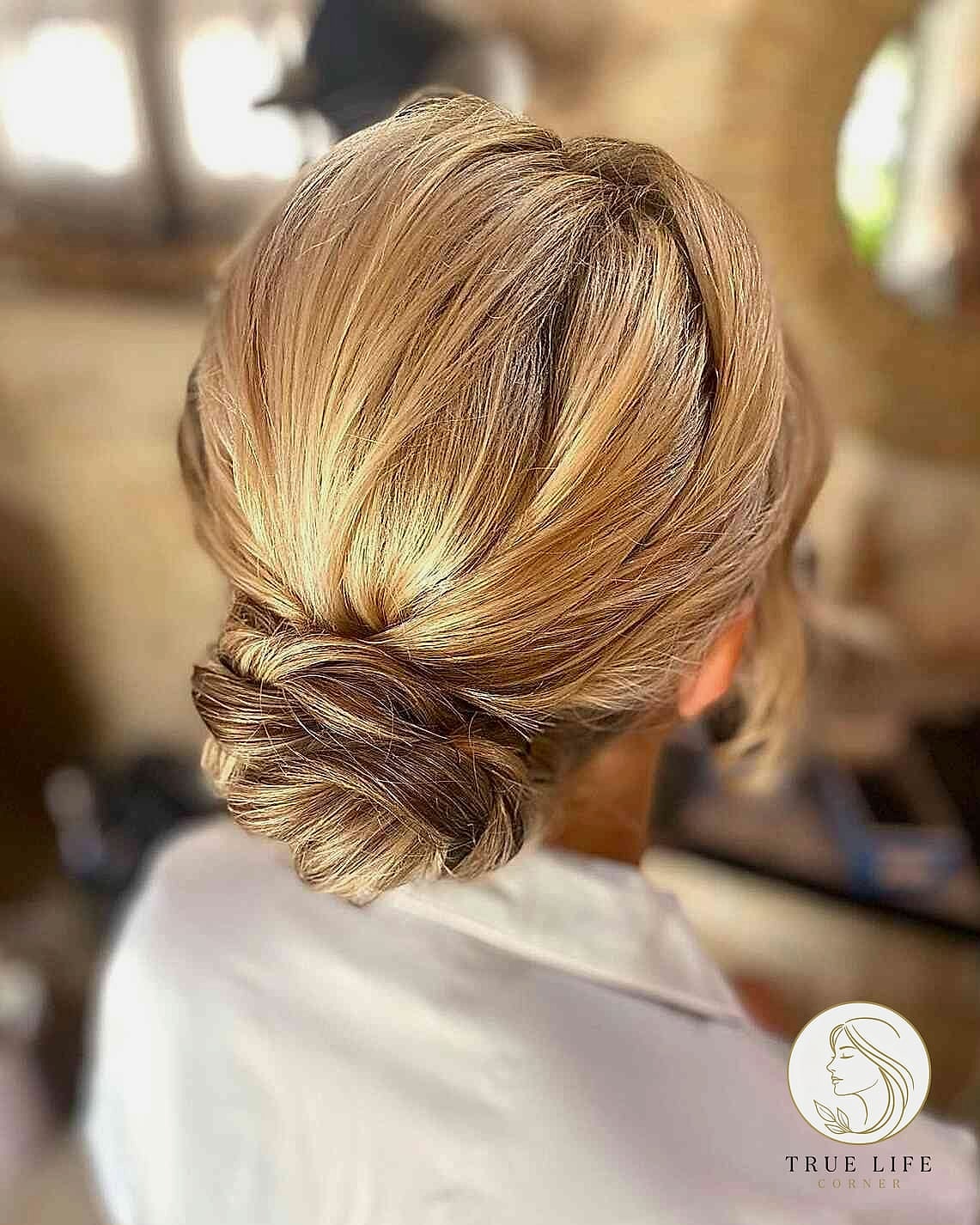 23 Wedding Guest Hairstyles For Long Hair to Transform Your Look Instantly 22 Twisted Updo with Loose Tendrils