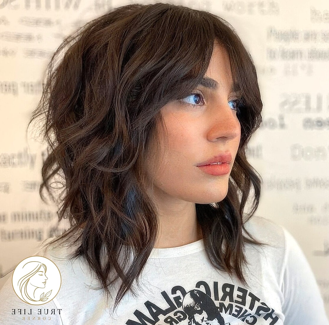 18 Cute Hairstyles For Medium Hair Perfect for Your Next Salon Appointment 10 Wolf Cut With Choppy Texture